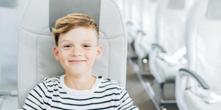 a child flying alone on an airBaltic plane