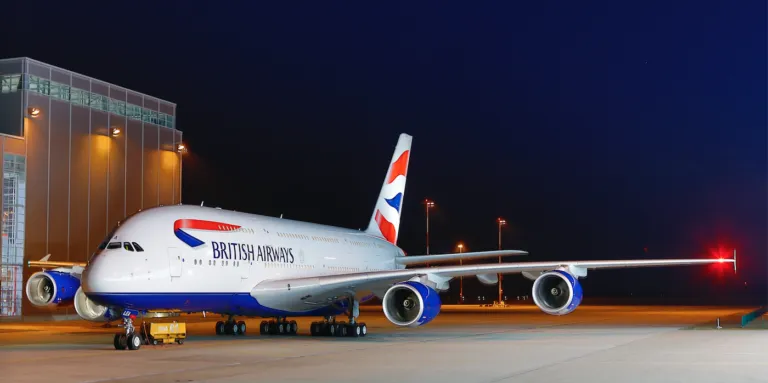 A British Airways A380 parked on the tarmac outside the Lufthansa Technik Philippines facility in Manila