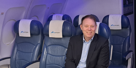 Michael Savidge sitting in an aircraft seat