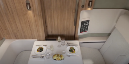 The large table in the Qantas A250-1000 first-class suite is large enough for a companion to join for working or dining
