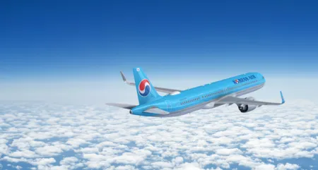 A Korean Air A321neo flying through the sky