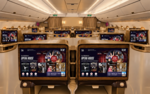 The image showcases Emirates’ business class seats featuring ice Opera House, a specially curated collection of full-length opera, ballet and symphony performances on the ice inflight entertainment system