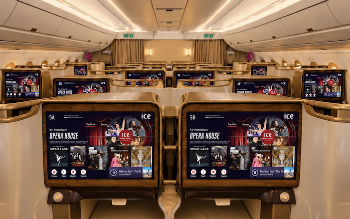 The image showcases Emirates’ business class seats featuring ice Opera House, a specially curated collection of full-length opera, ballet and symphony performances on the ice inflight entertainment system